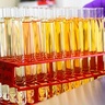 Rack full of test tubes filled with liquid