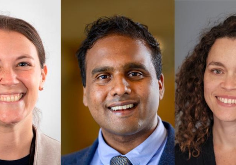 Image of three people smiling. One man and two women.